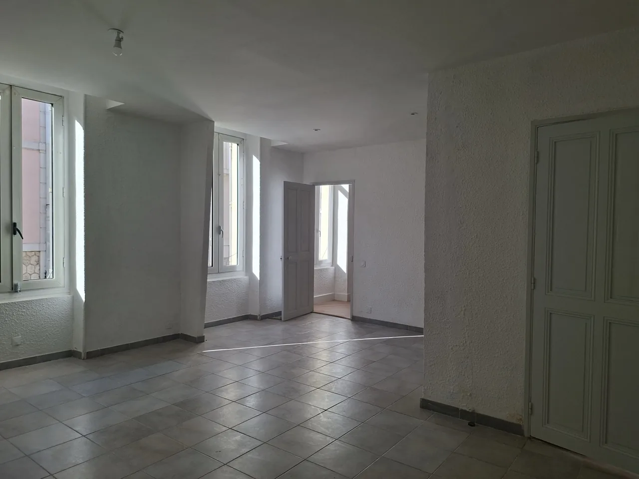 Appartement T3 de 57 m² en rez-de-chaussée proche centre-ville